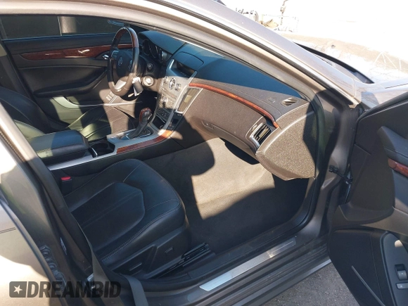 2012 Cadillac CTS Premium with VIN 1G6DS5E3XC0128264, listed as a IAAI auction lot 41964295 with 117,889 mi miles and . Bid and sale history available at DreamBid. Image 5.