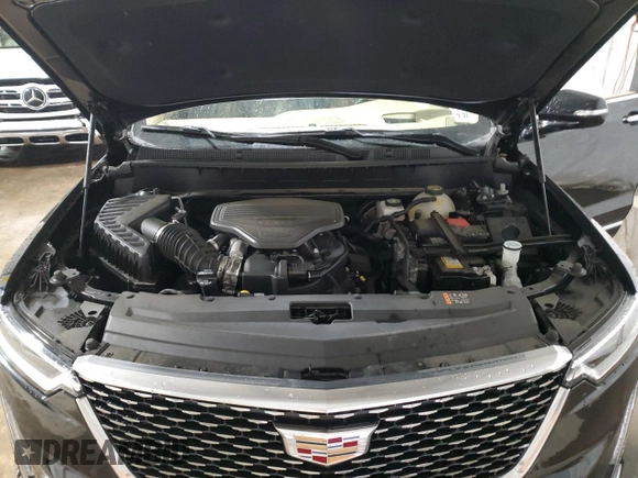 2022 Cadillac XT6 Premium Luxury with VIN 1GYKPFRS0NZ154930, listed as a Copart auction lot 88454595 with 26,334 mi miles and Salvage Title. Bid and sale history available at carsss.com. Image 12.