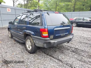 2003 Jeep Grand Cherokee Laredo z VIN 1J4GW48S73C553686, wystawiony jako IAAI lot #42278695 z przebiegiem 154 374 mil mil oraz . Historia ofert i sprzedaży dostępna na DreamBid. Obrazek 3.