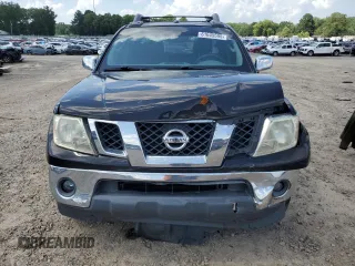 2011 Nissan Frontier SL with VIN 1N6AD0ERXBC440046, listed as a Copart auction lot 61645595 with 130,639 mi miles and Salvage title. Bid and sale history available at DreamBid. Image 5.