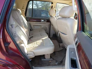 2004 Lincoln Navigator Luxury with VIN 5LMFU27R64LJ13317, listed as a IAAI auction lot 40598909 with 240,131 mi miles. Bid and sale history available at carsss.com. Image 8.