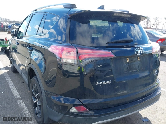 2018 Toyota RAV4 SE with VIN 2T3JFREVXJW817341, listed as a IAAI auction lot 41599972 with 99,739 mi miles. Bid and sale history available at carsss.com. Image 3.