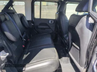 2023 Jeep Wrangler Sahara with VIN 1C4JJXP65PW661194, listed as a Copart auction lot 55729925 with 24,264 mi miles and Clean Title. Bid and sale history available at DreamBid. Image 11.