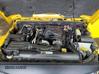 2015 Jeep Wrangler Unlimited Sahara with VIN 1C4BJWEG1FL704231, listed as a Copart auction lot 46683275 with 133,097 mi miles and Salvage Title. Bid and sale history available at carsss.com. Image 12.