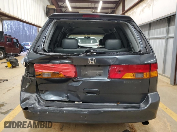 2003 Honda Odyssey EX-L z VIN 5FNRL18993B142649, wystawiony jako Copart lot #86397154 z przebiegiem 339 966 mil mil oraz Szkoda całkowita • Salvage title. Historia ofert i sprzedaży dostępna na DreamBid. Obrazek 6.