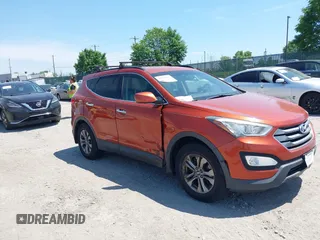2016 Hyundai Santa Fe z VIN 5XYZUDLB7GG327435, wystawiony jako IAAI lot #42240711 z przebiegiem 233 289 mil mil oraz . Historia ofert i sprzedaży dostępna na DreamBid. Obrazek 1.
