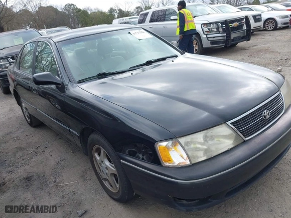 1999 Toyota Avalon XL with VIN 4T1BF18B2XU330305, listed as a IAAI auction lot 41717284 with NaN miles. Bid and sale history available at carsss.com. Image 1.