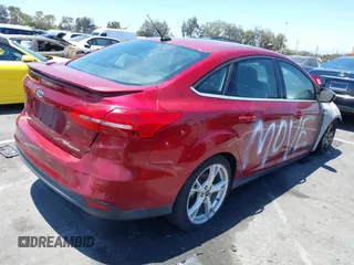 2016 Ford Focus Titanium with VIN 1FADP3J28GL362154, listed as a IAAI auction lot 42624259 with 15,000 mi miles and . Bid and sale history available at DreamBid. Image 4.