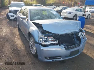 2012 Chrysler 300 Limited with VIN 2C3CCACG9CH166184, listed as a IAAI auction lot 42058060 with 97,897 mi miles and . Bid and sale history available at carsss.com. Image 6.