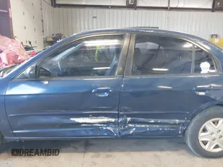 2003 Honda Civic LX with VIN 2HGES16583H529254, listed as a IAAI auction lot 42010247 with 238,517 mi miles. Bid and sale history available at carsss.com. Image 14.