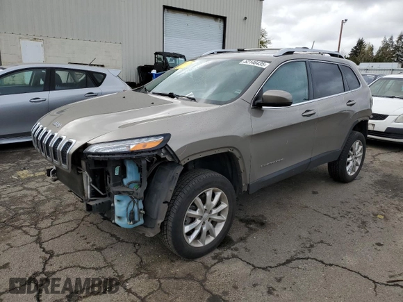 2017 Jeep Cherokee Limited with VIN 1C4PJMDSXHW633757, listed as a Copart auction lot 52146435 with 104,066 mi miles and Salvage Title. Bid and sale history available at DreamBid. Image 1.