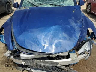 2022 Tesla Model Y Long Range z VIN 7SAYGDEE8NF447410, wystawiony jako Copart lot #54860765 z przebiegiem Nie podano mil oraz Szkody całkowita. Historia ofert i sprzedaży dostępna na DreamBid. Obrazek 11.