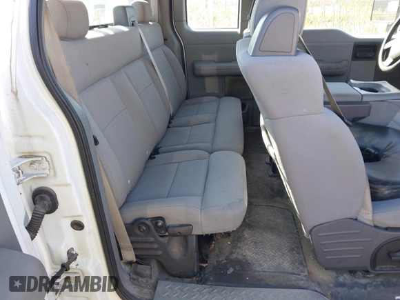 2005 Ford F-150 STX with VIN 1FTRX14W95FB53021, listed as a IAAI auction lot 42138458 with 150,885 mi miles. Bid and sale history available at carsss.com. Image 8.