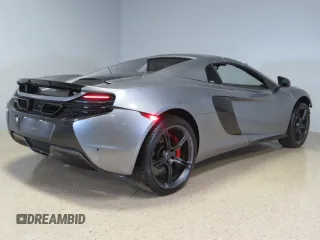 2016 McLaren 650S z VIN SBM11FAA1GW006061, wystawiony jako Copart lot #73406814 z przebiegiem 16 999 mil mil oraz Szkody całkowita. Historia ofert i sprzedaży dostępna na DreamBid. Obrazek 3.