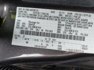 2015 Ford Focus ST with VIN 1FADP3L9XFL227184, listed as a IAAI auction lot 41397453 with 71,061 mi miles. Bid and sale history available at carsss.com. Image 9.
