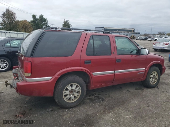 1999 GMC Jimmy SLE with VIN 1GKDT13W3X2546163, listed as a Copart auction lot 79842734 with 144,800 mi miles and Salvage Title. Bid and sale history available at carsss.com. Image 3.