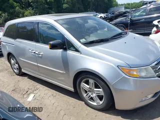 2012 Honda Odyssey Touring with VIN 5FNRL5H9XCB026741, listed as a IAAI auction lot 42808245 with 293,422 mi miles and . Bid and sale history available at DreamBid. Image 13.