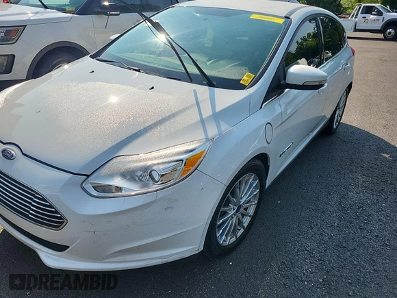 2016 Ford Focus Electric z VIN 1FADP3R47GL320483, wystawiony jako IAAI lot #42392319 z przebiegiem 74 612 mil mil oraz . Historia ofert i sprzedaży dostępna na DreamBid. Obrazek 7.