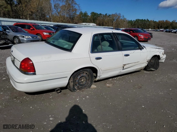 2000 Ford Crown Victoria LX with VIN 2FAFP74W0YX125595, listed as a Copart auction lot 84675434 with 151,438 mi miles and Salvage Title. Bid and sale history available at carsss.com. Image 3.