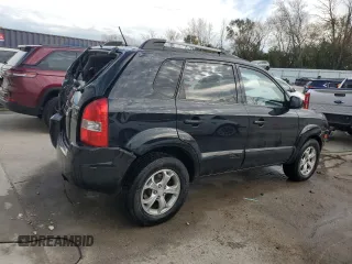 2009 Hyundai Tucson SE with VIN KM8JN72D69U974579, listed as a Copart auction lot 76964564 with 98,569 mi miles and Non Repairable. Bid and sale history available at carsss.com. Image 3.