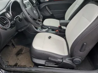 2017 Volkswagen Beetle SE with VIN 3VWJ17AT4HM630760, listed as a Copart auction lot 53664365 with 35,010 mi miles and Salvage Title. Bid and sale history available at DreamBid. Image 7.