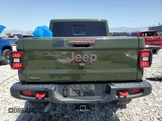 2023 Jeep Gladiator Rubicon с VIN 1C6JJTBM8PL515539, выставлен на аукционе Copart как лот 61076725 с пробегом 21 434 миль миль и Списание • Salvage title. История ставок и продаж доступна на DreamBid. Изображение 6.