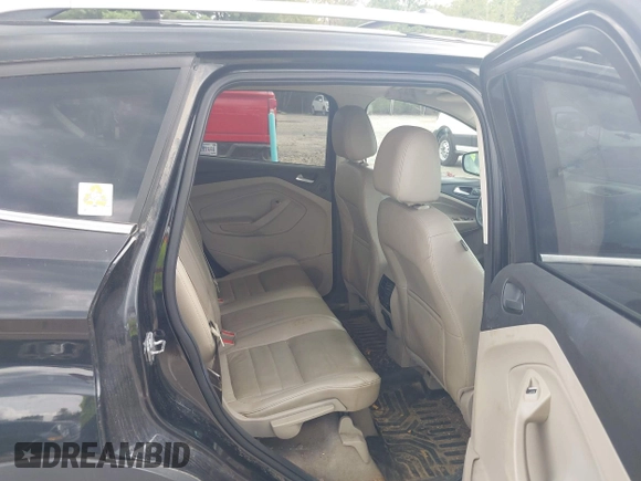 2015 Ford Escape Titanium with VIN 1FMCU9J92FUA96987, listed as a IAAI auction lot 42678423 with 188,956 mi miles and . Bid and sale history available at DreamBid. Image 8.
