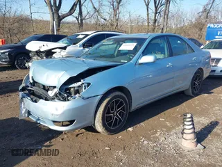 2006 Toyota Camry LE z VIN 4T1BF30K46U621829, wystawiony jako IAAI lot #41068239 z przebiegiem 96 942 mil mil oraz . Historia ofert i sprzedaży dostępna na DreamBid. Obrazek 17.