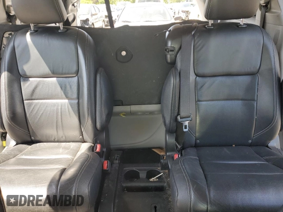 2015 Toyota Sienna SE с VIN 5TDXK3DC6FS632845, выставлен на аукционе Copart как лот 56070745 с пробегом 154 254 миль миль и Списание • Salvage title. История ставок и продаж доступна на DreamBid. Изображение 10.