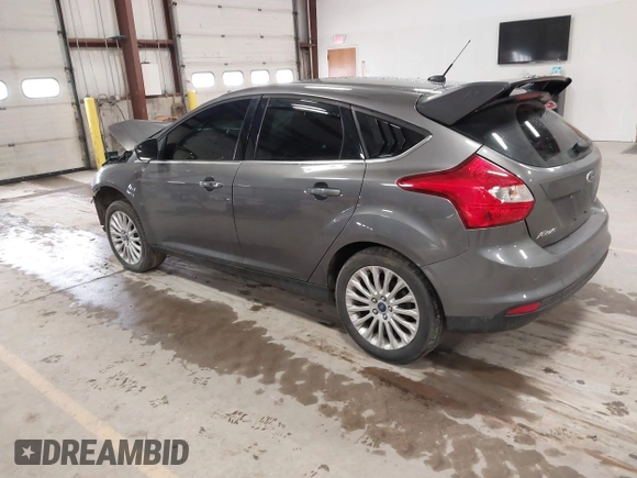 2012 Ford Focus Titanium with VIN 1FAHP3N27CL313288, listed as a IAAI auction lot 41741895 with 140,376 mi miles and . Bid and sale history available at carsss.com. Image 3.