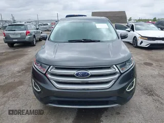 2015 Ford Edge Titanium z VIN 2FMTK3K81FBB88882, wystawiony jako IAAI lot #42184698 z przebiegiem 161 858 mil mil oraz . Historia ofert i sprzedaży dostępna na DreamBid. Obrazek 12.