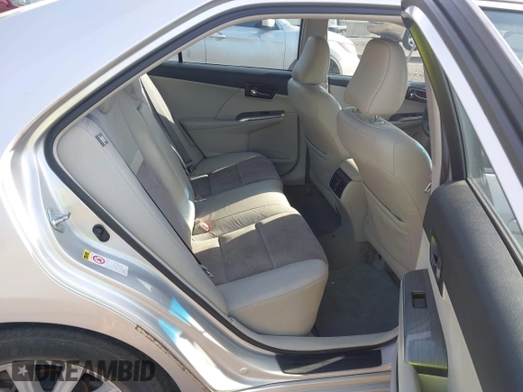 2012 Toyota Camry XLE z VIN 4T1BD1FK4CU017422, wystawiony jako IAAI lot #42366815 z przebiegiem 156 506 mil mil oraz . Historia ofert i sprzedaży dostępna na DreamBid. Obrazek 8.