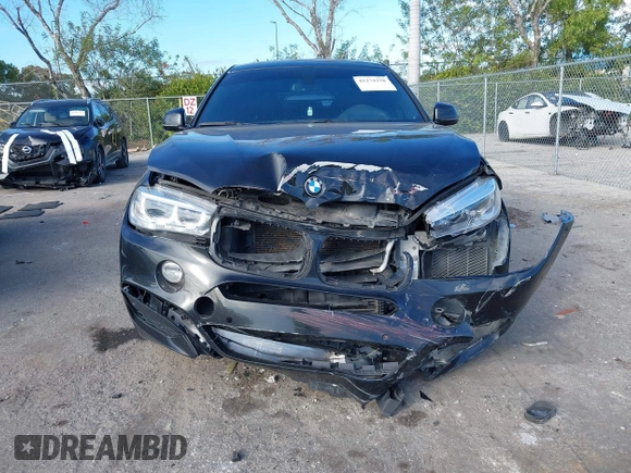 2018 BMW X6 sDrive35i with VIN 5UXKU0C5XJ0G80724, listed as a IAAI auction lot 41274338 with 122,696 mi miles. Bid and sale history available at carsss.com. Image 6.