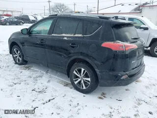 2018 Toyota RAV4 XLE with VIN 2T3RFREV8JW851250, listed as a IAAI auction lot 41164994 with 63,005 mi miles. Bid and sale history available at carsss.com. Image 3.
