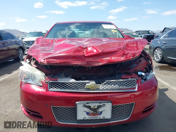 2014 Chevrolet Impala LT with VIN 2G1WB5E38E1132304, listed as a IAAI auction lot 42072869 with 128,579 mi miles and . Bid and sale history available at DreamBid. Image 12.