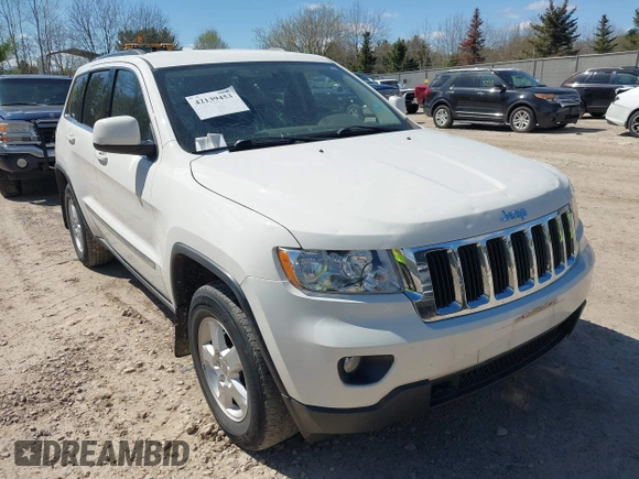 2011 Jeep Grand Cherokee Laredo with VIN 1J4RR4GG9BC556083, listed as a IAAI auction lot 42139453 with 145,623 mi miles and . Bid and sale history available at DreamBid. Image 1.