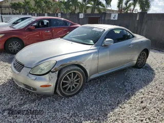 2004 Lexus SC 430 with VIN JTHFN48Y240051291, listed as a Copart auction lot 77631944 with 169,055 mi miles and Salvage Title. Bid and sale history available at DreamBid. Image 1.