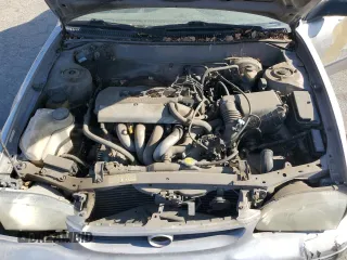1998 Toyota Corolla VE with VIN 1NXBR12E3WZ093073, listed as a Copart auction lot 58270705 with 303,875 mi miles and Salvage title. Bid and sale history available at DreamBid. Image 11.
