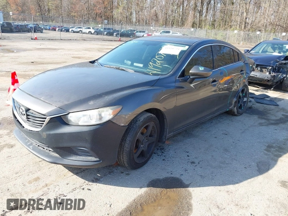 2016 Mazda 6 i Sport with VIN JM1GJ1U59G1402840, listed as a IAAI auction lot 41920724 with 147,527 mi miles and . Bid and sale history available at DreamBid. Image 17.