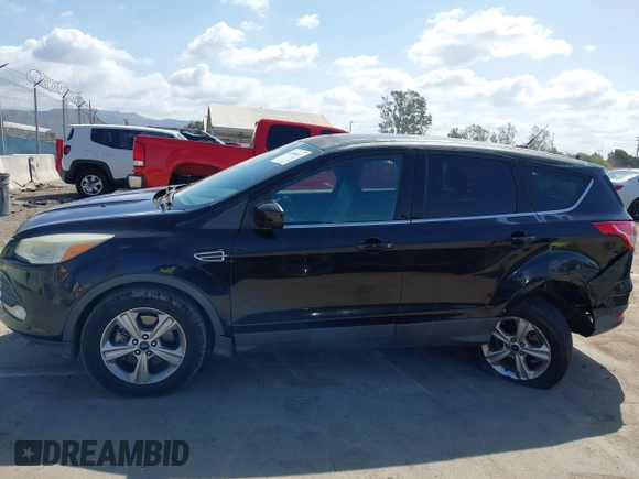 2015 Ford Escape SE with VIN 1FMCU0G91FUA18588, listed as a IAAI auction lot 41958047 with 111,523 mi miles. Bid and sale history available at carsss.com. Image 14.