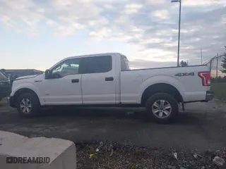 2015 Ford F-150 XLT w/HD Payload Pkg with VIN 1FTFW1EG3FFC39052, listed as a IAAI auction lot 41046847 with 151,061 mi miles. Bid and sale history available at carsss.com. Image 14.
