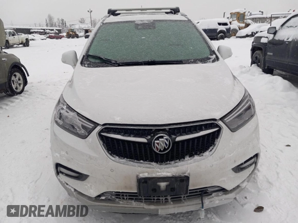 2019 Buick Encore Essence with VIN KL4CJGSM5KB738932, listed as a Copart auction lot 83087444 with 59,162 mi miles and Salvage Title. Bid and sale history available at DreamBid. Image 5.