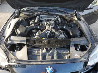2015 BMW M6 z VIN WBSLX9C52FD160752, wystawiony jako Copart lot #83657994 z przebiegiem Nie podano mil oraz Czysty tytuł • Clean title. Historia ofert i sprzedaży dostępna na DreamBid. Obrazek 11.
