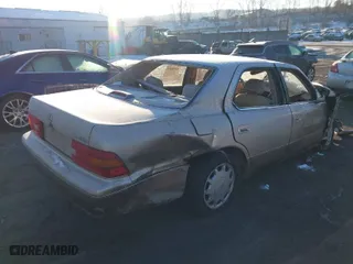 1997 Lexus LS 400 Luxury Sdn with VIN JT8BH28F4V0087106, listed as a IAAI auction lot 41395435 with 295,953 mi miles. Bid and sale history available at carsss.com. Image 4.