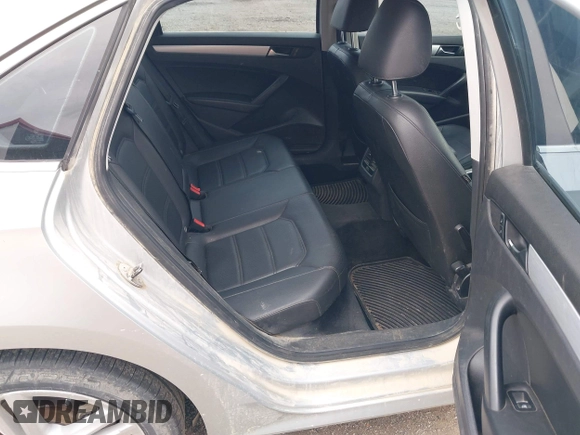 2013 Volkswagen Passat SE z VIN 1VWBN7A30DC056730, wystawiony jako IAAI lot #42542464 z przebiegiem 190 608 mil mil oraz . Historia ofert i sprzedaży dostępna na DreamBid. Obrazek 8.