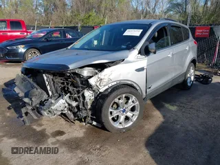 2013 Ford Escape SEL with VIN 1FMCU0HX4DUB98238, listed as a IAAI auction lot 41973221 with 131,590 mi miles and . Bid and sale history available at DreamBid. Image 18.
