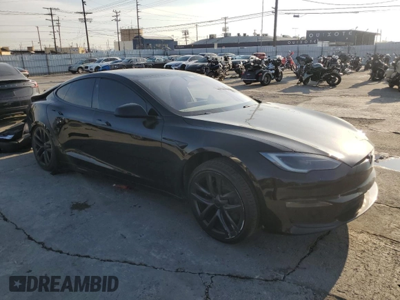 2022 Tesla Model S with VIN 5YJSA1E51NF482745, listed as a Copart auction lot 42562955 with 75,573 mi miles and Salvage Title. Bid and sale history available at DreamBid. Image 4.
