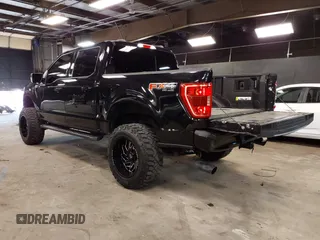 2021 Ford F-150 XL with VIN 1FTFW1E57MFA64154, listed as a IAAI auction lot 42480601 with 39,339 mi miles and . Bid and sale history available at DreamBid. Image 3.