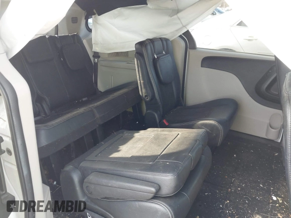 2019 Dodge Grand Caravan SXT with VIN 2C4RDGCG4KR771745, listed as a IAAI auction lot 41859267 with 97,436 mi miles and . Bid and sale history available at DreamBid. Image 8.