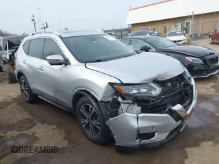 2017 Nissan Rogue SV with VIN 5N1AT2MV5HC870880, listed as a IAAI auction lot 41591726 with 97,627 mi miles. Bid and sale history available at carsss.com. Image 1.